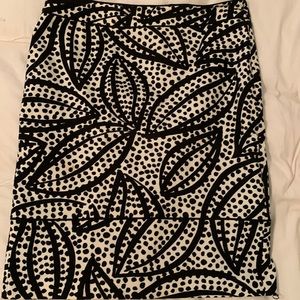 Playful design-can take you through all seasons. Very gently used!